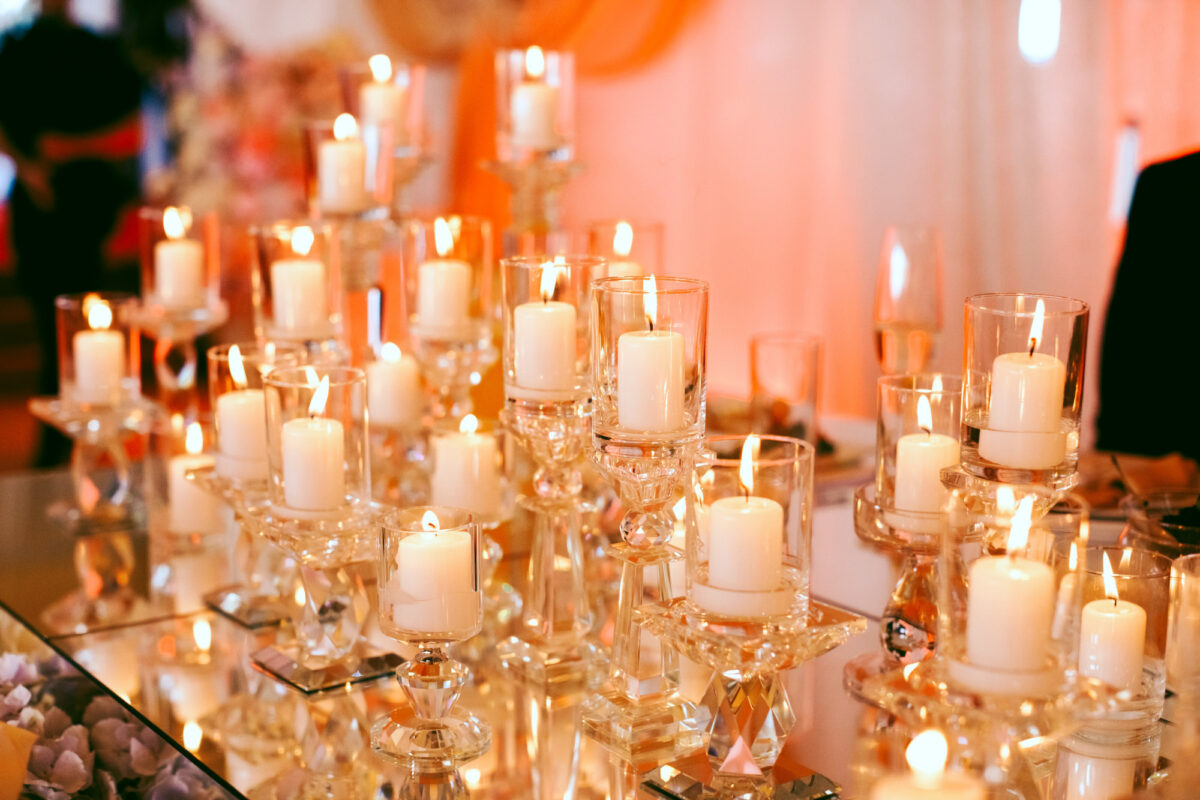 lots-burning-white-candles-table